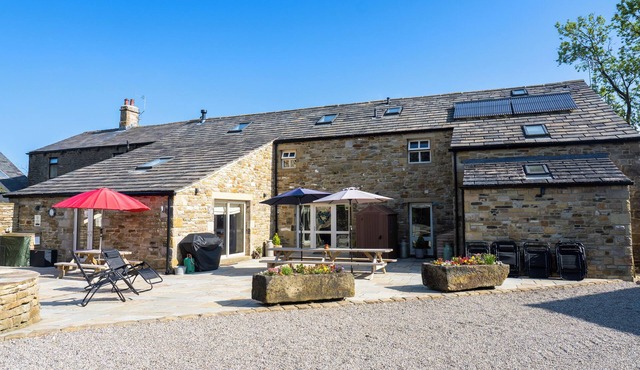 Beautiful old barn converted into holiday accommodation with a woodfired hot tub