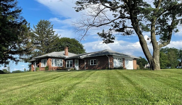 Beautiful open and spacious ranch home in country setting