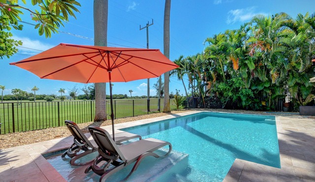 Beautiful Pool home on Golf Course, with Intracoastal views, 1 mile to the Beach