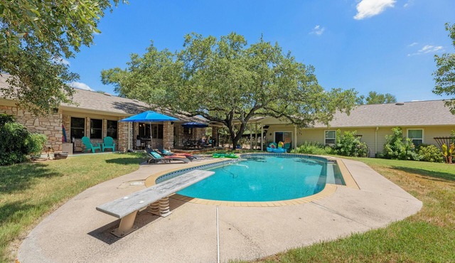 Beautiful Pool home on 2.5 acres with a serene country feel with urban location