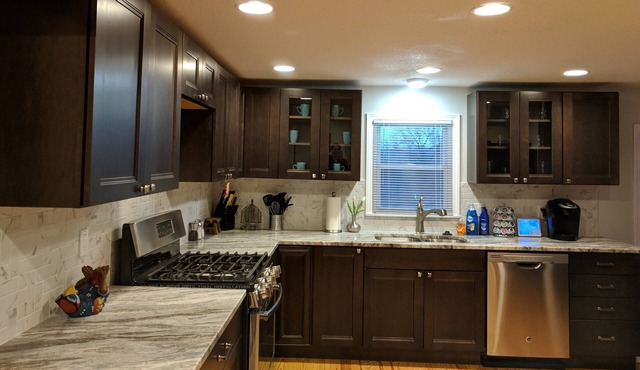 Beautiful renovated ranch on 1 acre, 2 miles from the stadiums.