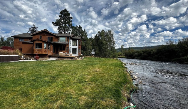 Beautiful river front home with fly fishing skiing hiking kayaking and much more