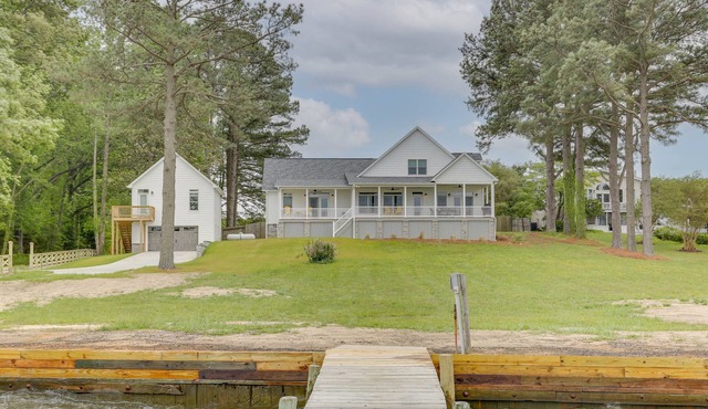Beautiful river house with dock and boat house