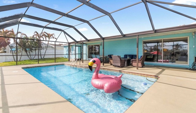 Beautiful Riverfront House — Screened Lanai, Pool, Private Dock & Pet‑Friendly! 🌊