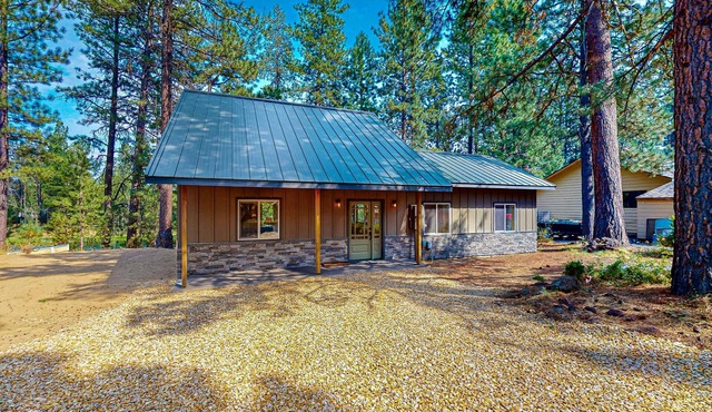Beautiful riverfront home with private dock, fireplace, WiFi, and patio