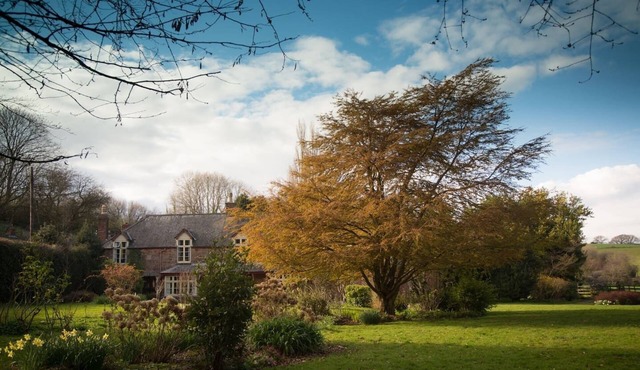 Beautiful Riverside Georgian 8 Bed Farmhouse with extensive gardens and fields