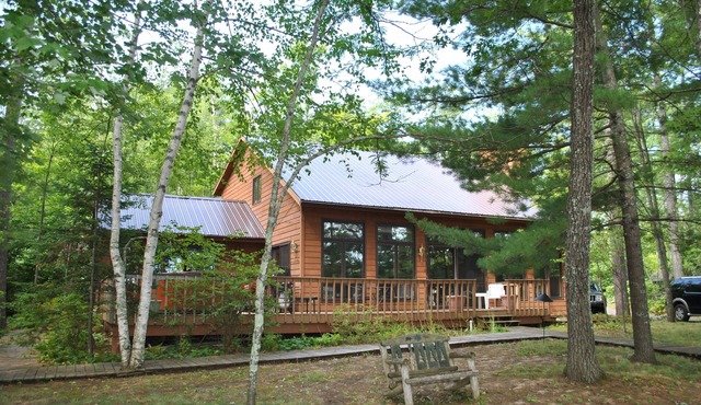 Beautiful round lake northern cedar modern vacation home