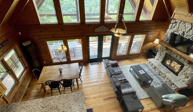 Beautiful secluded cabin - sleeps 12, fire pit, fishing pond, grill, game room