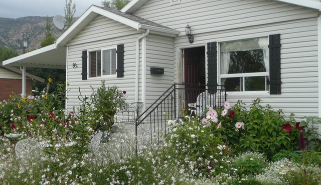 Beautiful small Garden Surrounding This Little Home. Clean and Comfortable.