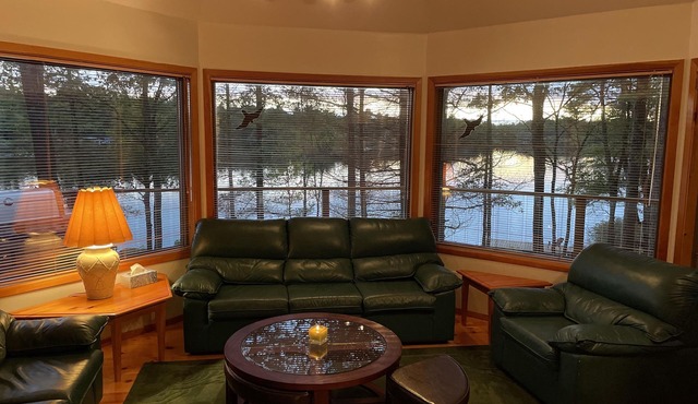 Beautiful south facing lakefront cottage with sauna & hot tub on Big Cedar Lake!