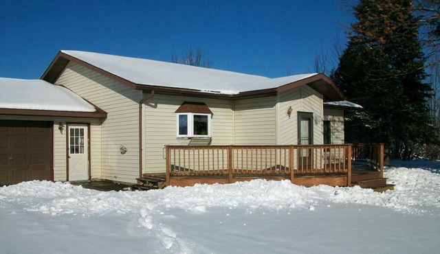 Beautiful, spacious 3 BR, 2BA home, close to everything the UP has to offer!