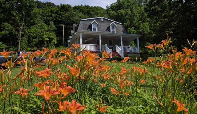 Beautiful, spacious home on Yough River and bike trail with hot tub