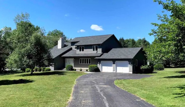 Beautiful, spacious home on four private acres