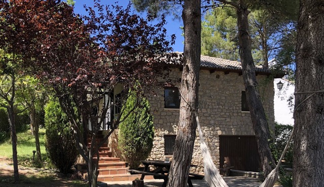 beautiful stone house with garden