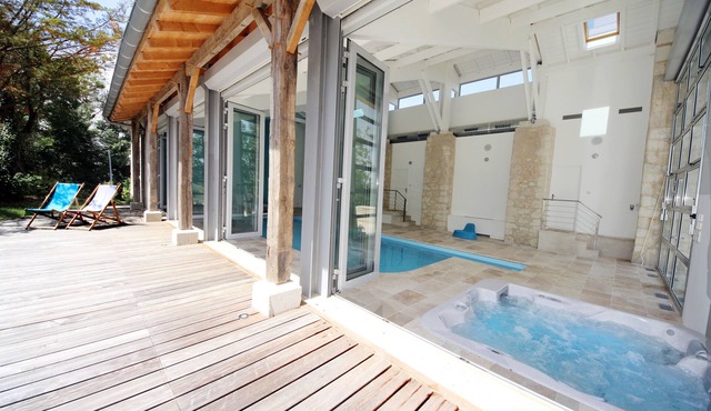 Beautiful stylish converted barn, indoor pool, hot tub, tennis and outdoor pool.