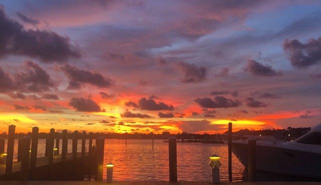 Beautiful sunset waterfront 1st floor marina villa. Quiet safe gated community.