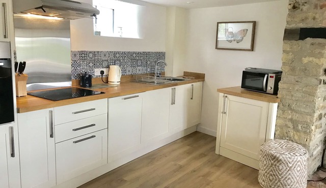 Beautiful thatched country cottage, quiet countryside position .