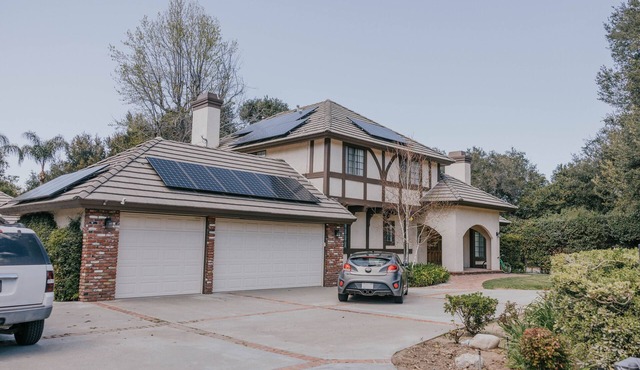 Beautiful Tudor Home with Pool in Peaceful Neighborhood