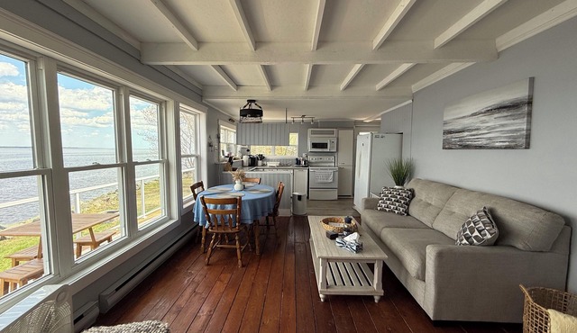 Beautiful two-bedroom waterfront cottage. Unbelievable Sunsets.