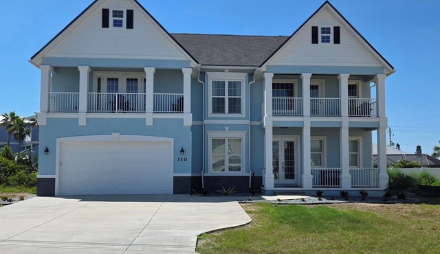 Beautiful two-story single family beach home with a private pool and ocean views