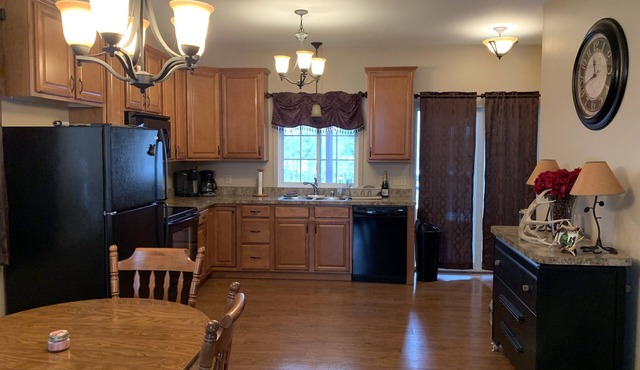 Beautiful Two story camp with Lake access, Full bar and Pellet fire place