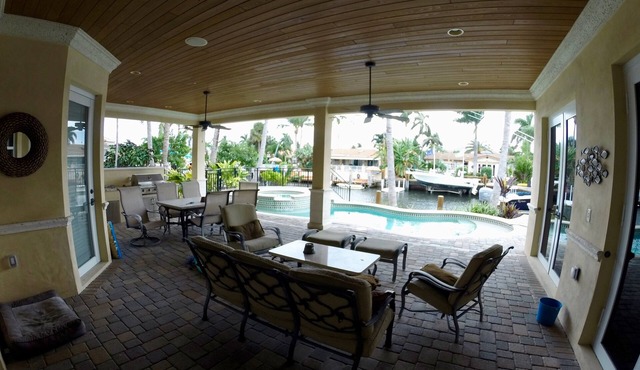 Beautiful Two-Story Waterfront Home 4 BR And 3 1/2 Bath with pool and hot tub. .