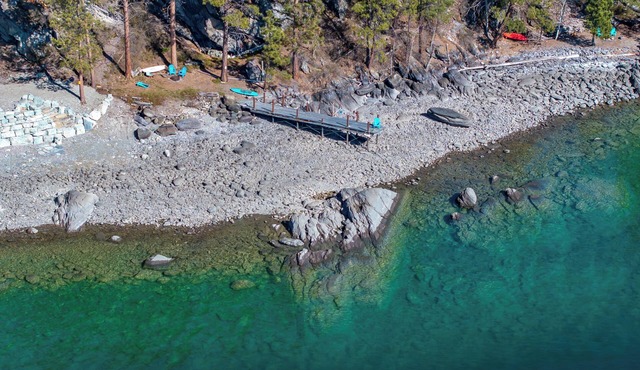 Beautiful & unique home with large windows and deck that overlook Flathead Lake