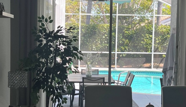 Beautiful updated heated pool home in a quiet, gated community.