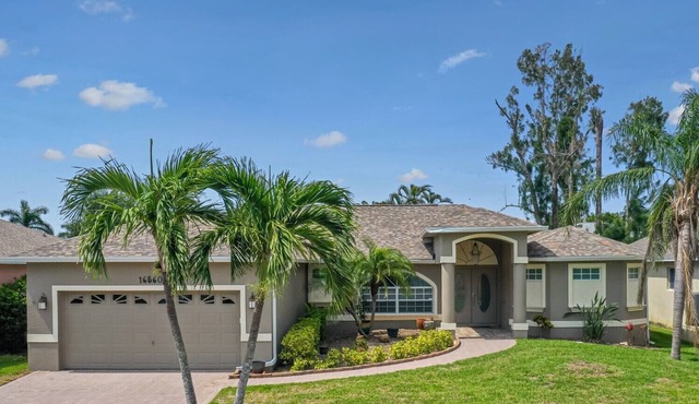 Beautiful updated home with new saltwater pool/lanai, and close to the beaches!