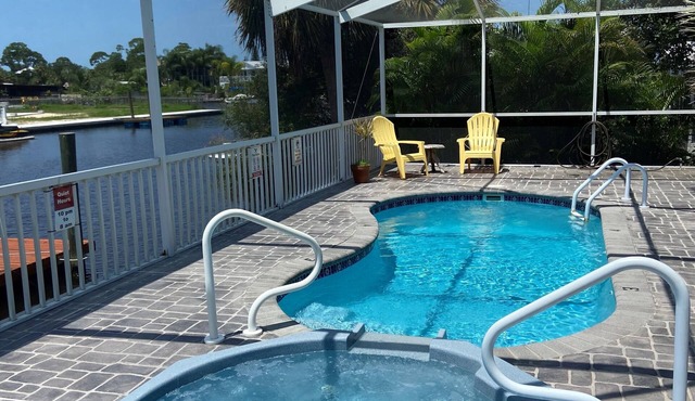 Beautiful view, heated Pool/Spa and private dock with direct Gulf access