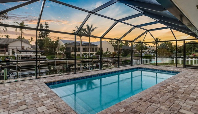 Beautiful Waterfront Pool Home, 4BR, 3BA, Heated Salt Water Pool
