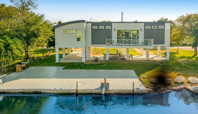 Beautiful waterfront home with central AC, dock, lovely balcony & patio