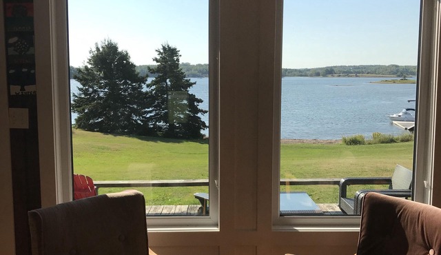 Beautiful waterfront property with large deck, lovely gazebo, and private dock.