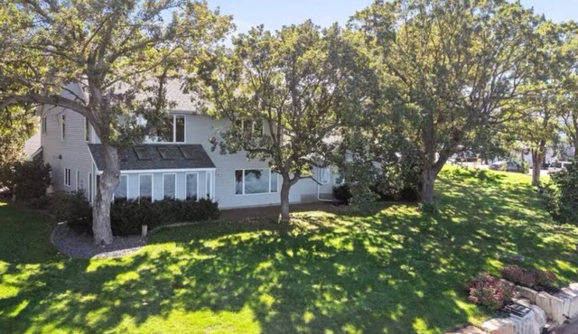 Beautiful Waterfront Estate with sandy shores, next to Willy Mccoys on the water