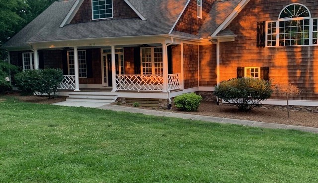 Beautiful waterfront! Large patio and covered porch. Dock, Fire pit, Game room
