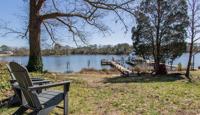 Beautiful waterfront home w/dock, fire-pit & deck