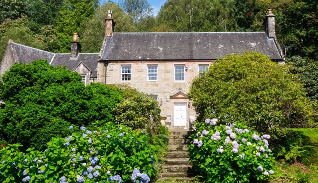 Beautiful waterside historical country house with magnificent garden