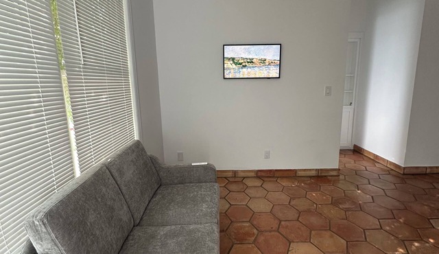 Beautiful well lit quaint first floor apartment High ceilings