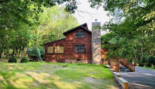 Beautiful wooden lodge cabin in the Heart of the Poconos.