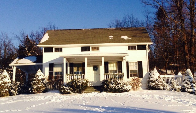 Beautifully designed Ladybug Hill Greek revival farmhouse