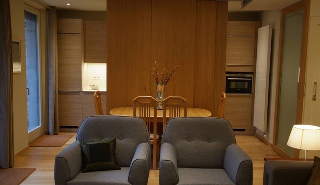 Beautifully furnished luxury one bedroom apartment with a small garden and pool