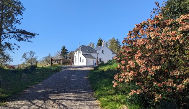 Beautifully positioned farmhouse overlooking hills and sea