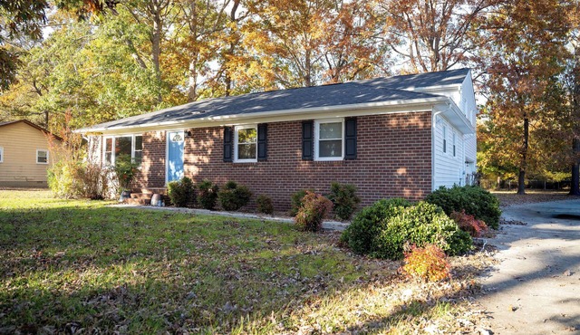 Beautifully Renovated 4 Bedroom Home; Fully Furnished & Move-in Ready.