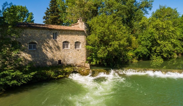Beautifully restored 18th-century mill on the river.