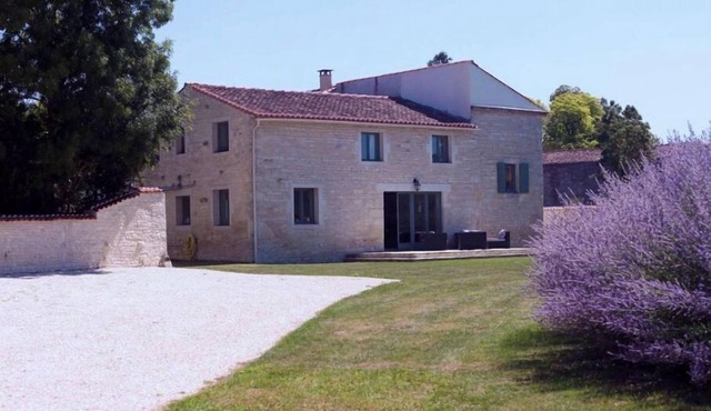 Beautifully restored farmhouse and grounds in the heart of a picturesque village