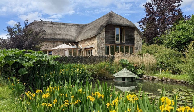 Beautifully restored medieval Dartmoor barn with luxury beds and bathrooms