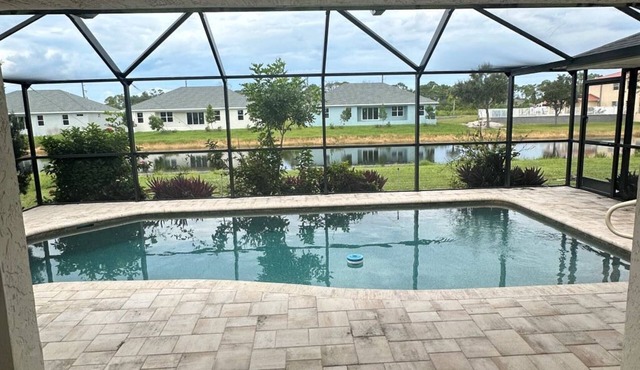 Beautifully updated canal waterfront 3/2 house with heated pool in Rotonda West.