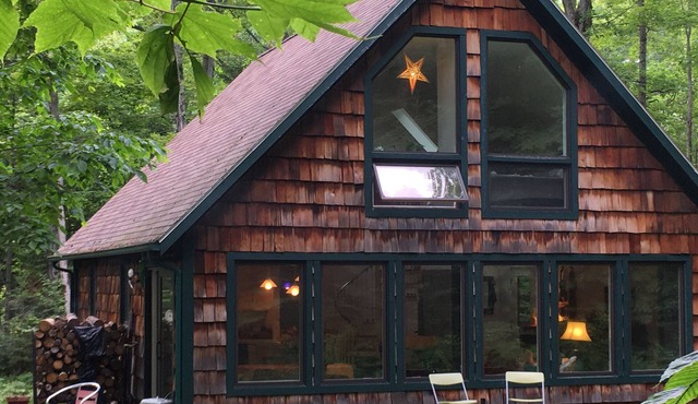 Beaver Island Chalet 2BR, 2BA sleeps 6, big windows overlooking lovely woods.