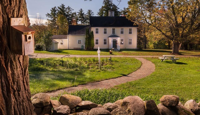 Beckons you to enjoy an idyllic farm stay in a colonial home for 16 guests.