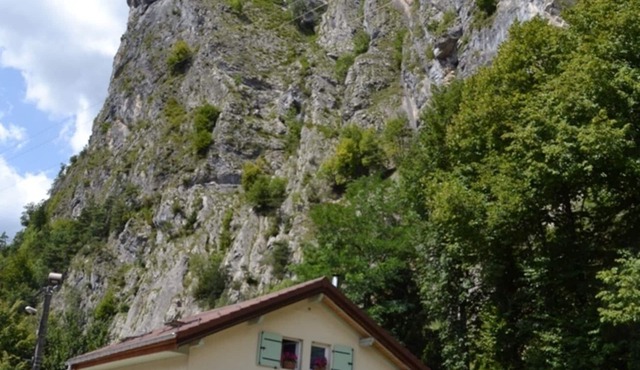 Bedroom and bathroom with toilet on the second floor of a townhouse